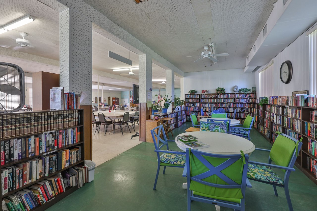 clubhouse. clubhouse with a library, kitchen, pool table, piano and more.